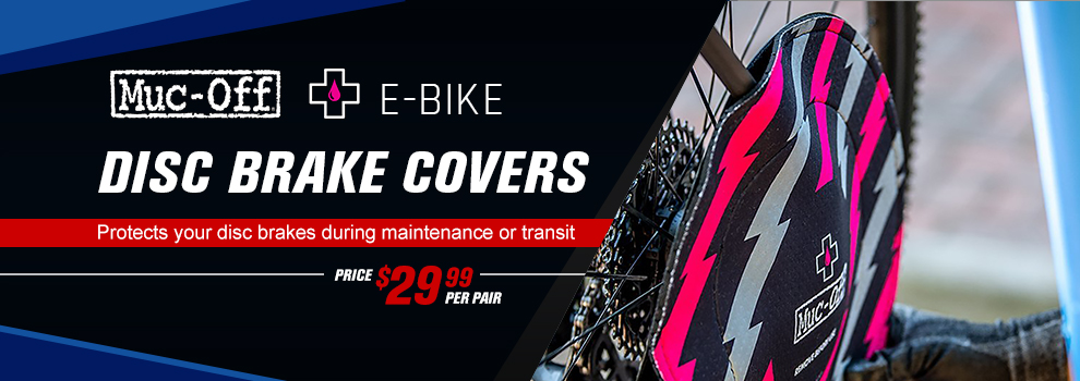 Muc-Off E-Bike, Disc brake covers, Protects your disc brakes during maintenance or transit, price twenty nine dollars and ninety nine cents per pair, SHOP button